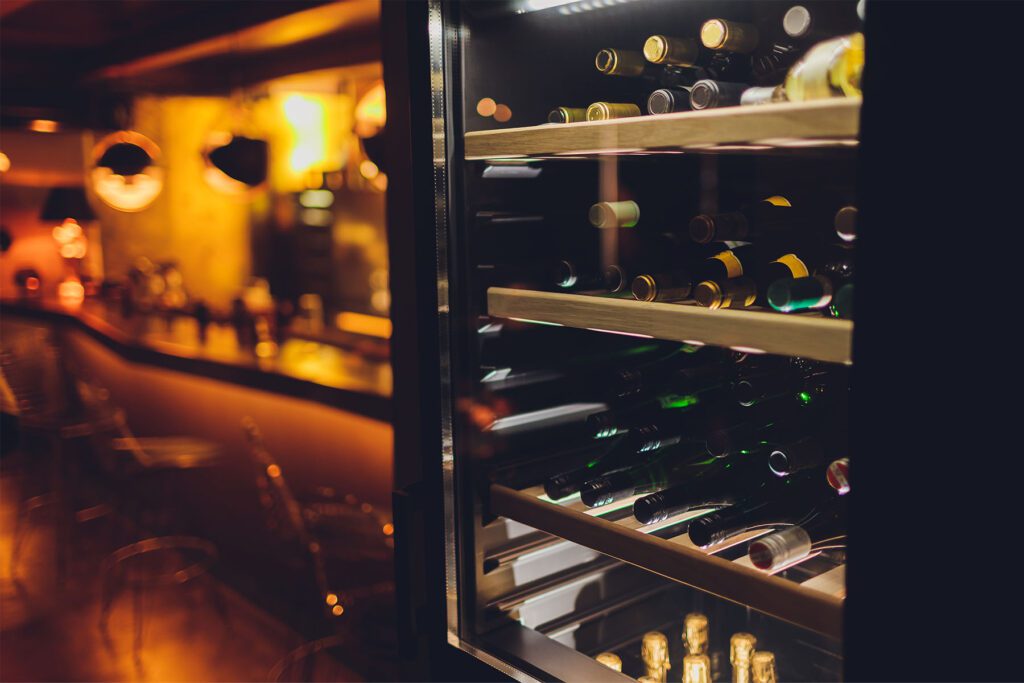 Closeup of a wine fridge at a bar