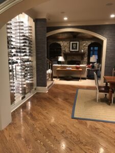 LED backlit glass wine wall in a dining room